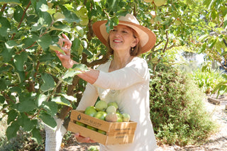 Juice Beauty Founder, Karen Behnke, Picking Apples at the Juice Beauty Farm