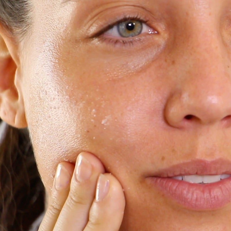 Woman Using STEM CELLULAR Exfoliating Peel Spray