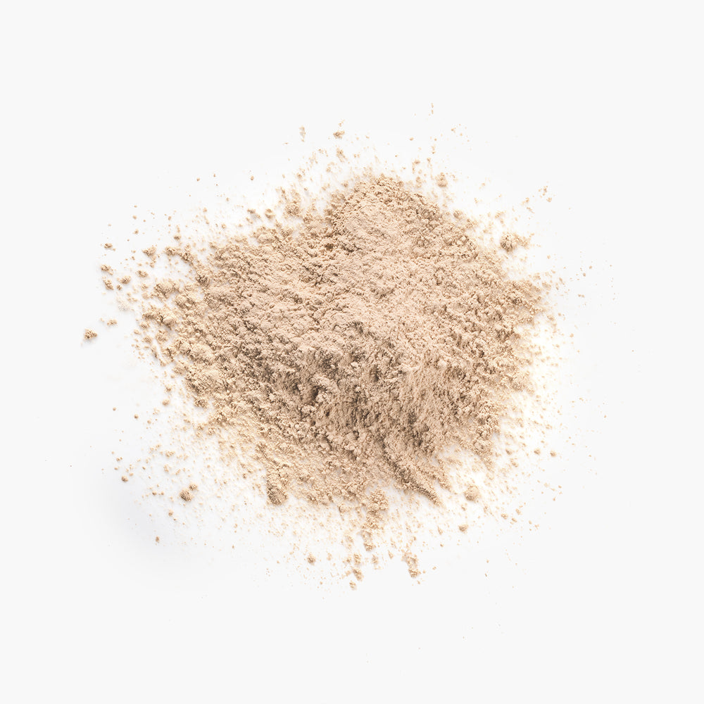 Flawless Finishing Powder sheer loose powder swatched on skin