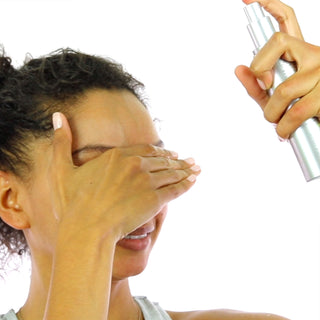 Woman Using STEM CELLULAR Exfoliating Peel Spray