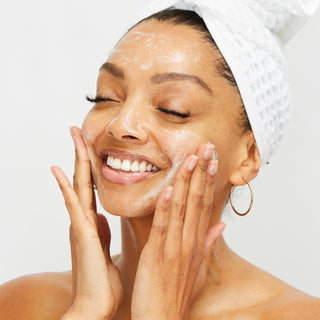 Woman Using Organic Blemish Clearing Cleanser